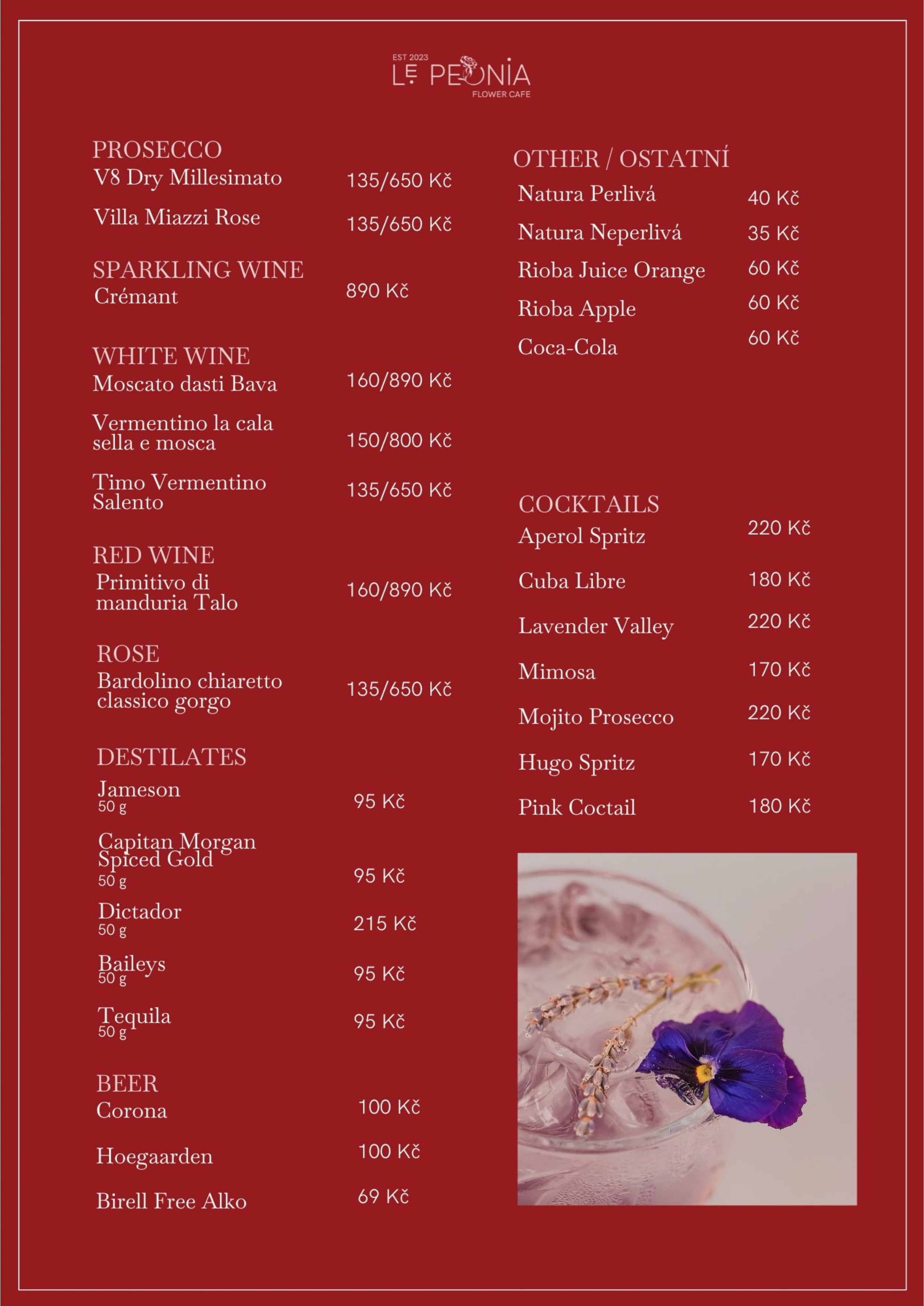 Luxurious drink menu from Le Peonia Flower Cafe on a rich red background. Features prosecco, sparkling wines, white and red wines, cocktails like Aperol Spritz and Cuba Libre, as well as juices, sodas, and beer